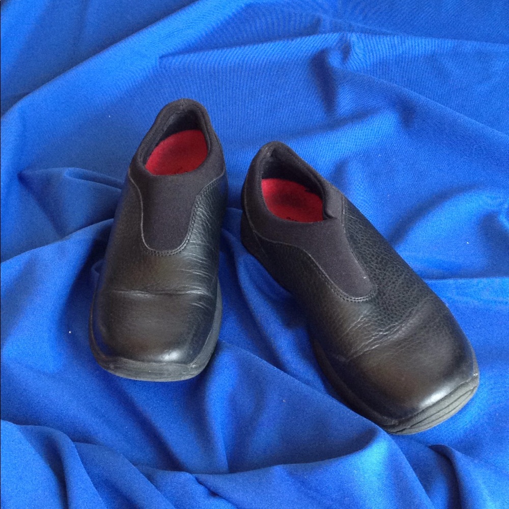 Merrell black leather slip ons